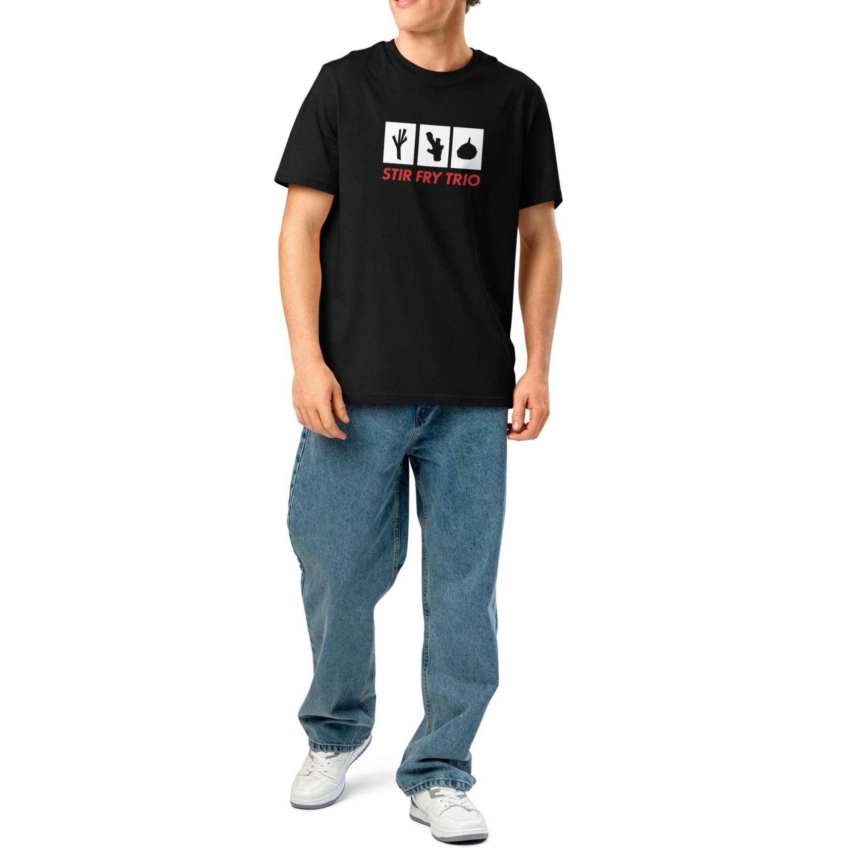 The stir fry trio tee in black, worn by a model to show its classic regular fit